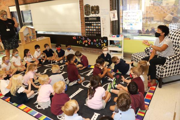 Columbus Academy PreK Teacher Reading to Students